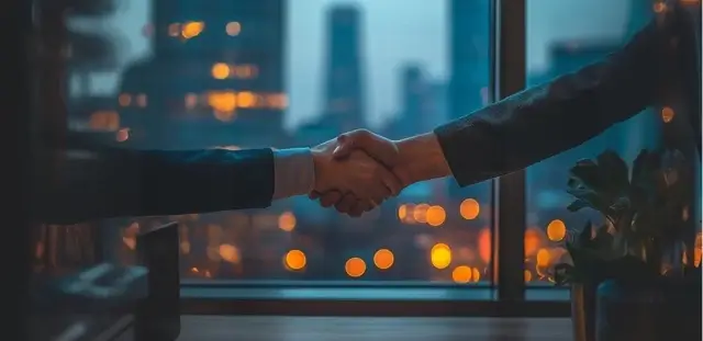 Reliable work ethic assessment illustration representing two people shaking hands in front of a high-rise office window at night